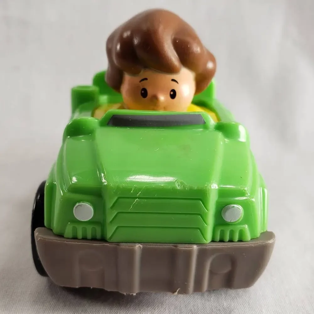 Little People Fisher-Price Brunette Girl Driving Green Tow Truck with Blue Hitch